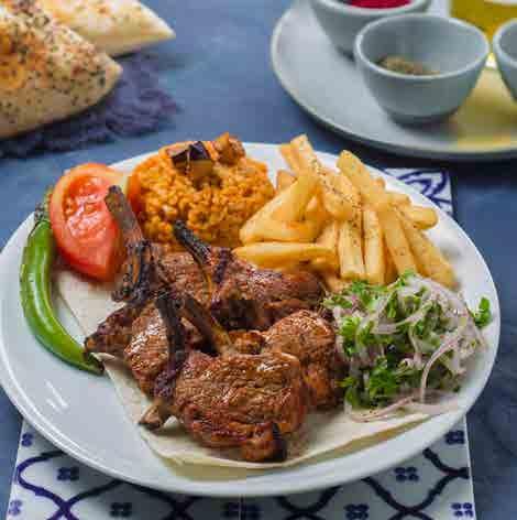 Mix Grill FROM THE GRILL مشاوي على الفحم Lamb Chops** 69 Pirzola Lamb chops (188g) marinated with Turkish spices Saslik Kebab** 58 Barbecued slices of specially marinated beef (146g) and onion rings
