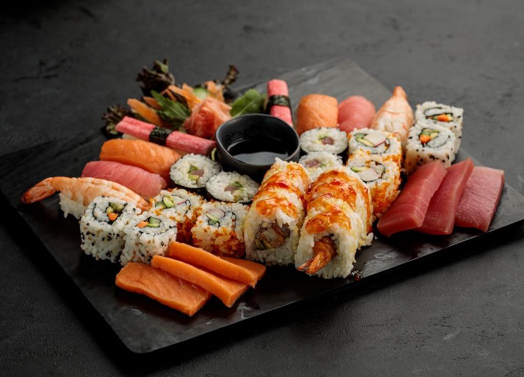SUSHI PLATTERS Assorted Sashimi - 8 pcs طبق الساشيمي 5.7 All Cooked - 16 pcs التشكيلة المطهية 8.5 4 Salmon, 4 Tuna تونا 4 سلمون 4 Combo Rolls - 16 pcs كومبو رولز 9.