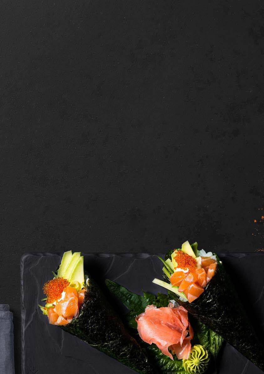 TEMAKI California Temaki Classic hand roll sushi with fresh salmon, cucumber, avocado & lettuce topped with Japanese mayo & tobiko. QR 25 /pc.