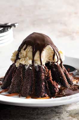 SWEET STUFF النهاية السعيدة MOLTEN CHOCOLATE CAKE (1150 Cal) Warm chocolate cake with chocolate fudge filling. Topped with vanilla ice cream under a crunchy chocolate shell.