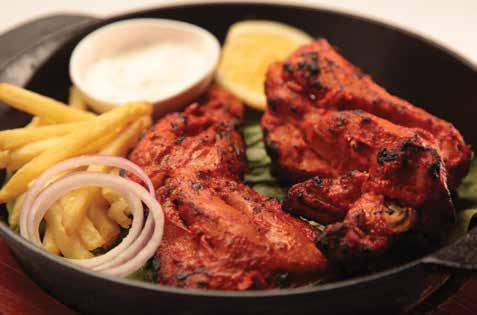 Marinated With Homemade Tikka Spices Cooked On Charcoal & Served With Fries 170 CHICKEN LEMON TIKKA 24 Boneless Pieces Of Chicken Well Marinated With Lemon Rinds, Cashewnuts, Cheese & Yoghurt Clay
