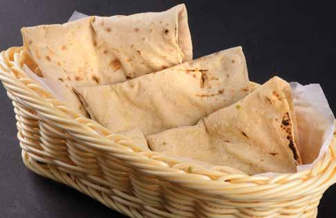 Clay Oven & Brushed With Butter 16 TANDOORI PARATA 4 Whole Wheat Bread Made In Layers Baked In Tandoor & Brushed With Butter 17 GARLIC NAN 5 A Flat Leavened Bread of Flour Topped With Garlic Baked In