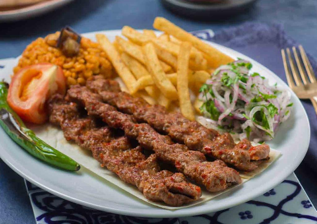 900 Tavuk Köşebaşı Kebap Chicken kebab mixed with red capsicum, parsley and Turkish spices طبق بيتي كباب** 7.