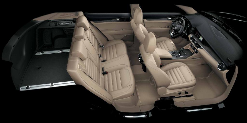 For a sports-oriented interior that s cosseting too, in typically Alfa Romeo style. The second row seats three adults in comfort, with easy access and plenty of leg room and knee room.