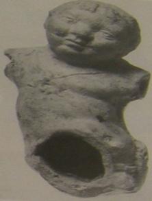 1 Breccia, Monuments de l'égypte Gréco-Romaine, Tav. XC, fig. 464-465, 43. كتالوج رقم )3 الموضوع: تمثال مجوف لطفل جالس القرفصاء. مكان الحفظ: مجموعة ش اريبر" Schreiber.Tübingen 5208/25 "Slg.