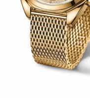 الصندوق 38 ملم المطلي بالذهب يحيط بإطار قرص متعدد العيون مزينة باللون األحمر و األبيض و األزرق علي ذراع الدقائق.