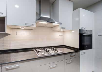 Kitchen Full height and under counter units: Gloss finish from the luxury German brand; Nolte. Worktop: Impervious granite top with stainless steel mounted sink and mixer tap.