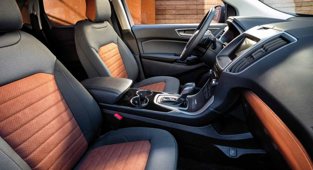 SEL SPORT APPEARANCE PACKAGE Inside, a high-contrast interior features Mayan Gray cloth-trimmed seats with Umber-colored Miko perforated inserts front and rear Black carpeted floor mats