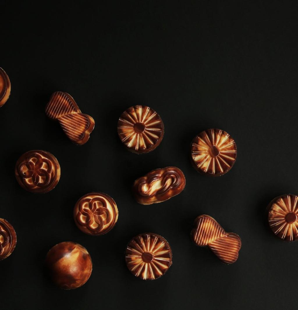Chocolate Catalogue كتا لو ج ا لشو كو ال كتا لو ج ا لشو كو ال تة Catalogue Chocolates PRM 04 PRM 05 PRM 06 Gianduja Cornflakes Praline Rice Krispies لوز Almond برالين بالرايس كرسبيز جاندوجا كورن