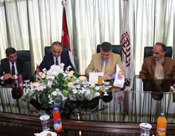 الوطنية Signing a memorandum of cooperation with the