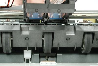 ink-absorbing pad Paper-Feed Mechanism Rollers