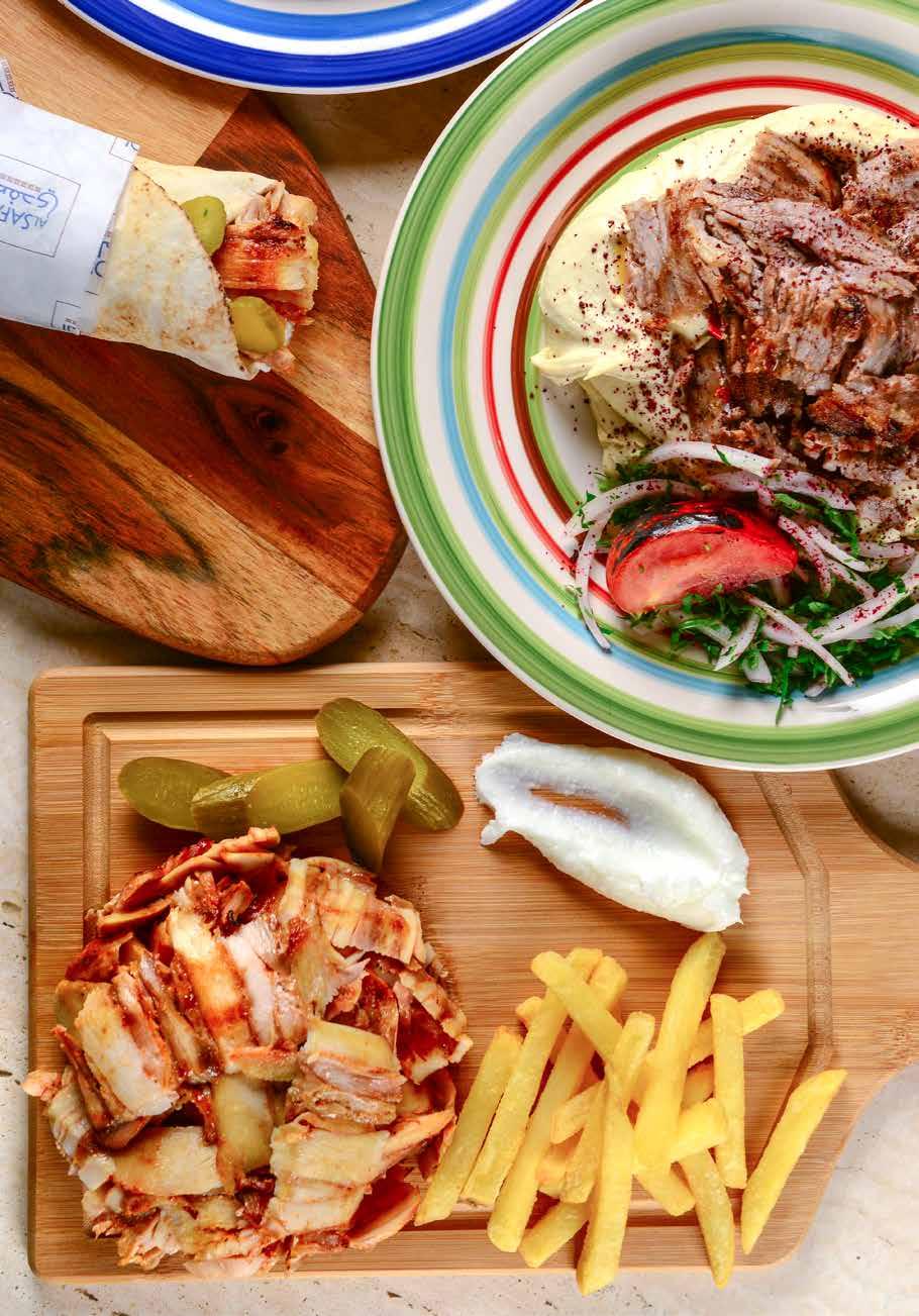 Chicken Shawarma Platter صحن شاورما دجاج With garlic sauce, french fries, and pickles مع ثوم بطاطا مقلية ومخلالت