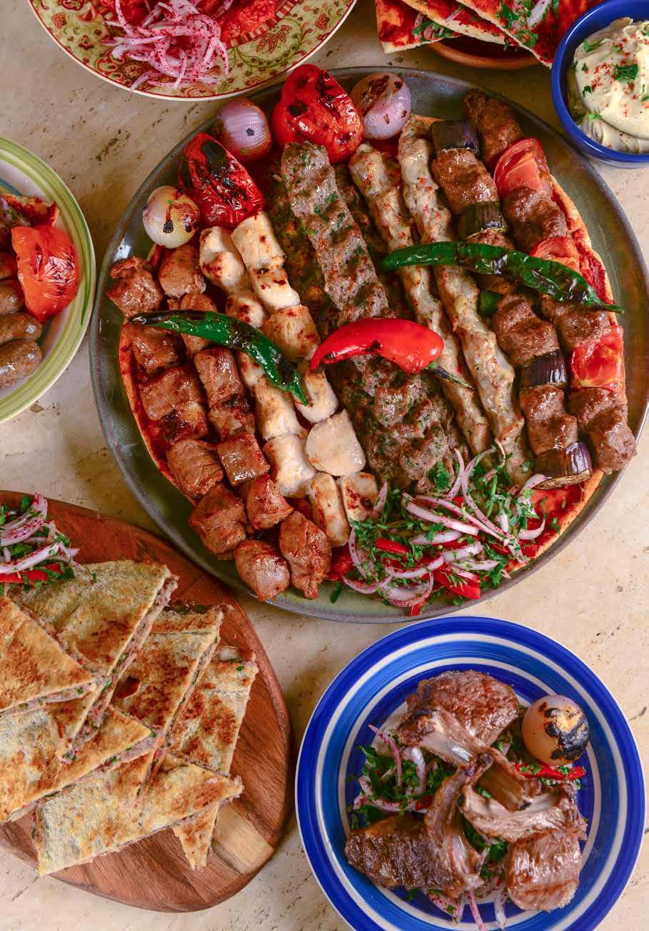 meat with onion and parsley Minced meat with chili paste and tomato cubes