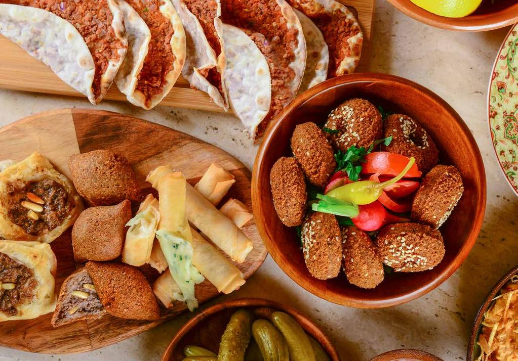 Hummus with Meat & Pine حمص مع لحمة و صنوبر Hummus with fried meat and pine nuts