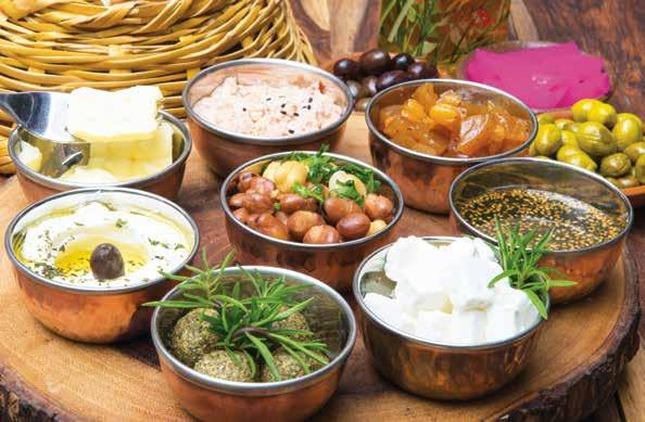 00 A combination of assorted dips zaatar, labneh, feta cheese, kishk, shanklish, foul, jam & butter, vegetables & olives & your choice of freshly squeezed orange or grapefruit juice/ coffee or tea