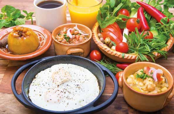 00 Sunny side up eggs, foul, balila, fresh vegetables & olives served with apple compote & your choice of freshly squeezed orange or grapefruit juice /coffee or tea فارمريز بريكفا ست بي ض مقلي عيون