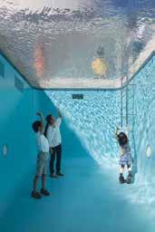 Leandro ERLICH, "The Swimming Pool", 2004 Photo: WATANABE Osamu Courtesy: 21st Century Museum of Contemporary Art, Kanazawa متحف القرن الحادي