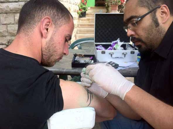 11 بدأ قبل عقود يف السجون ووصل إىل الشوارع حالي ا الوشم الفلسطيني: رغبة يف التميز.