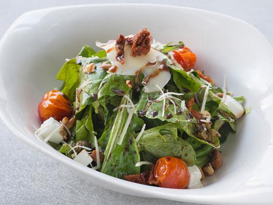 ر 45 276 سعر حراري Rocca salad tossed in balsamic vinaigrette, sundried tomatoes, cherry tomatoes, pine nuts, feta
