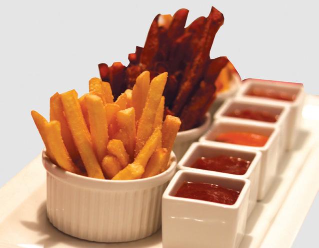 APPETIZERS & SPECIALTIES المقبات واألطباق المميزة Three fries and five ketchup sampler; batons with sea salt, wedges with parmesan