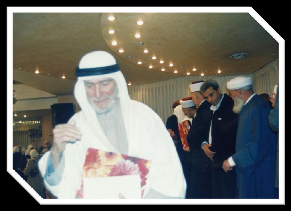 ممدا قامدت الدو ازرة بتمريمده مدرة اانيدة ا ت ارفدا بفضدبه وجىدودن حفظدده اا فددي تأويددل حفظددة متدداب اا المشددارمين فددي المسددابمات المحبيددة والدوليددة وذلددك فددي الحفددل الددذي أقامتدده الدددو