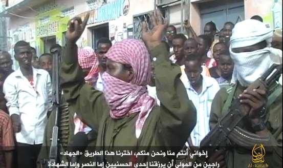 14 أبو دمحم والد الشهيد أيب سليم : كان طالب علم يعلم الناس القرآن ب انضم إىل ااكم اإلسالمية بعد أن تتلمذ على يديو أكثر من 911 طالب.